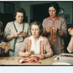 Group of women examining animal organs on a table, depicting haruspicy.
